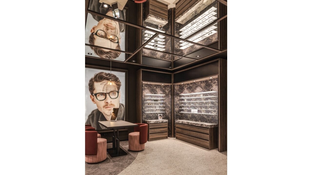 The glasses are presented on high-quality shelves that are equipped with LED lighting on both sides
