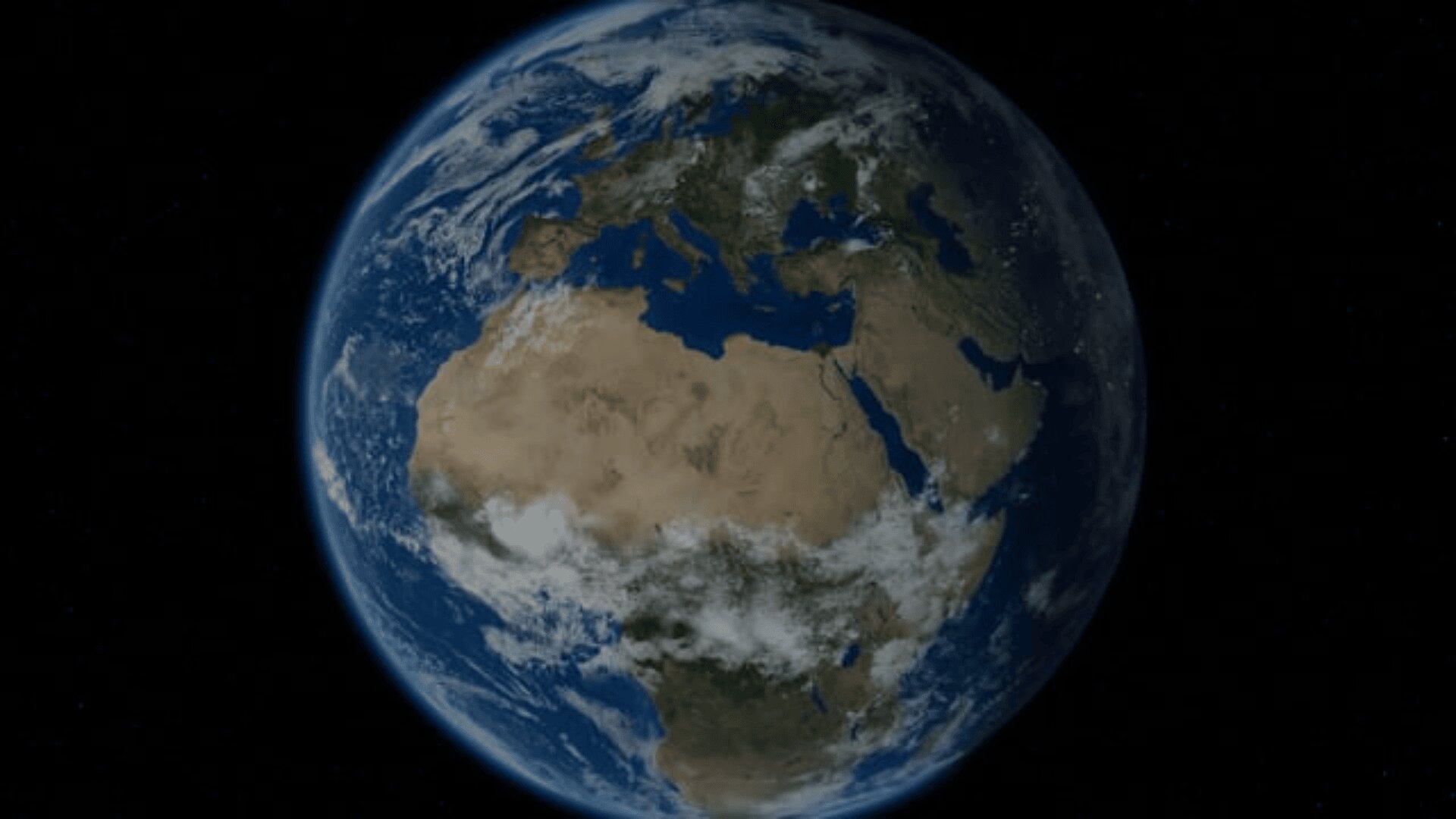 A view of Earth from space showing Africa, Europe, and parts of Asia surrounded by blue oceans and white clouds, set against the black background of space.