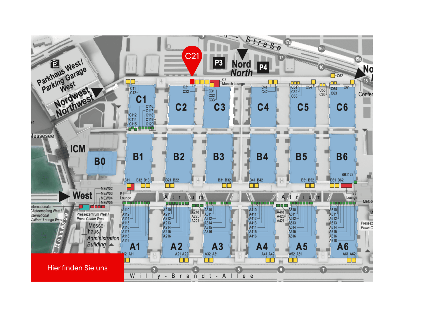 On the plan of an exhibition site, the halls are marked A1-A6, B1-B6 and C1-C6. A red marker with C21 and Here you will find us highlights a location in Hall C2 near the top center. Entrances and parking lots are marked.