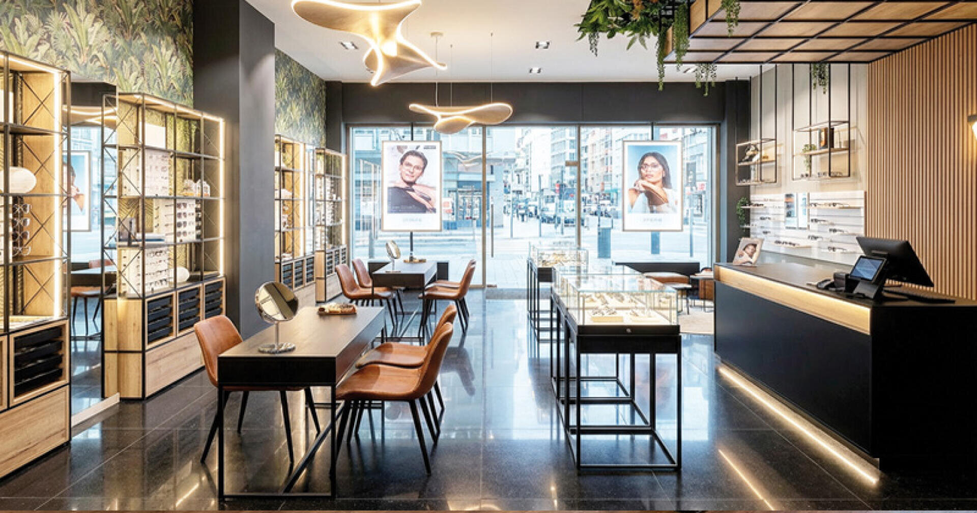 Modern eyewear store with slim display cases, wooden tables and chairs, large windows, hanging lamps and walls of glasses. Bright and inviting atmosphere with a view of the city outside.