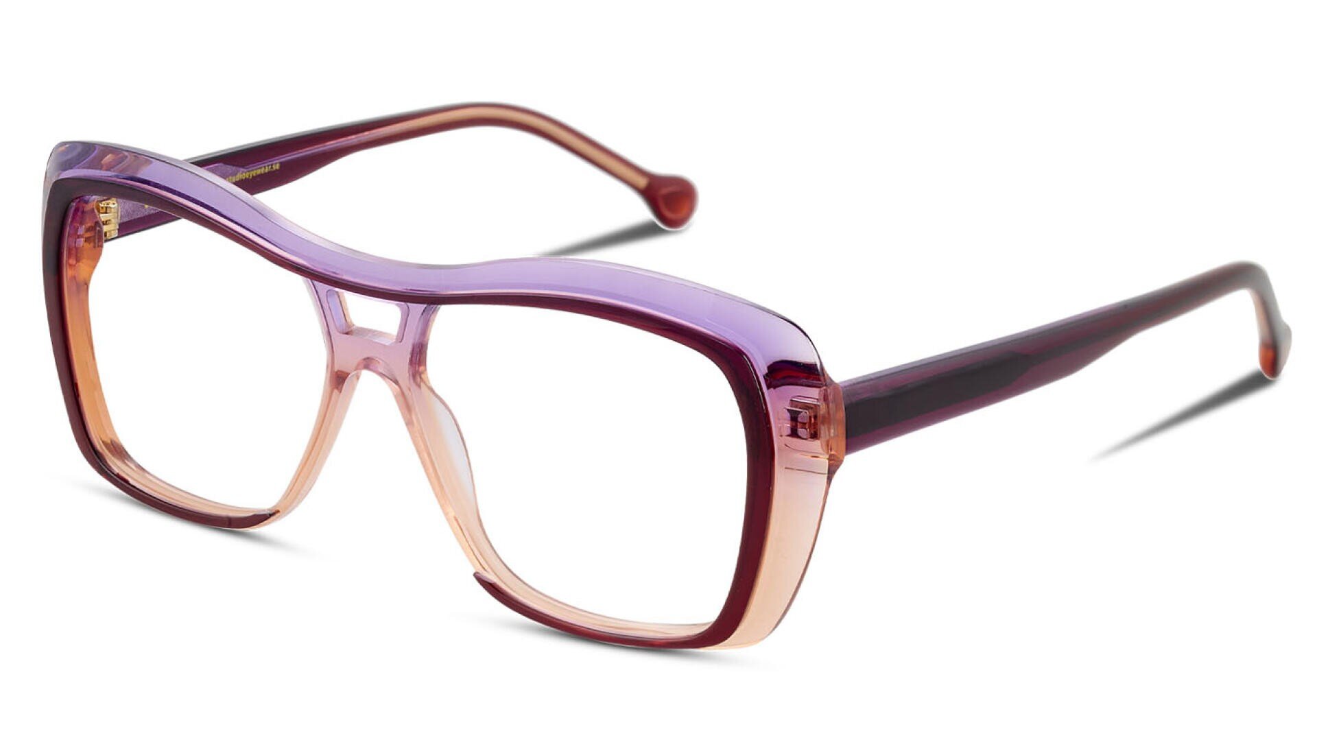 Eine rechteckige Brille mit einem dicken, transparenten Rahmen, der von einem hellen Lila am oberen Ende zu einem Pfirsich am unteren Ende übergeht. Die Bügel sind in einem dunkleren Lila-Ton gehalten.