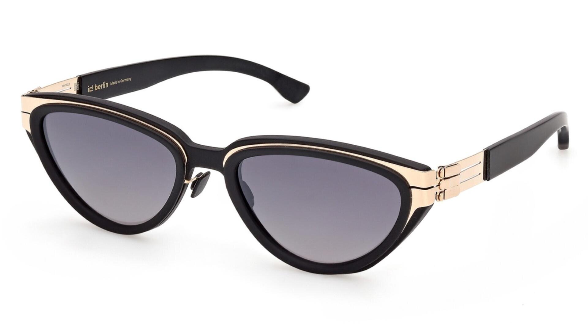 A pair of stylish cat-eye sunglasses with black frames, gold metallic accents on the temples, and dark tinted lenses.