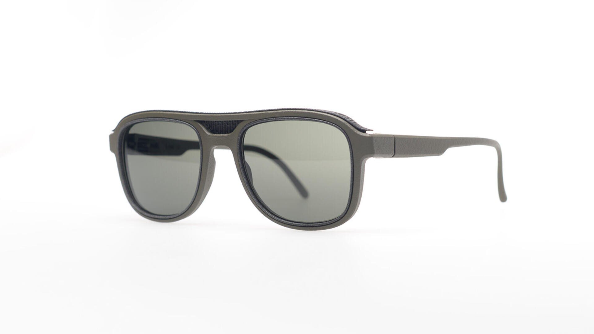 Black sunglasses with rectangular lenses and a sturdy frame, displayed on a white background.