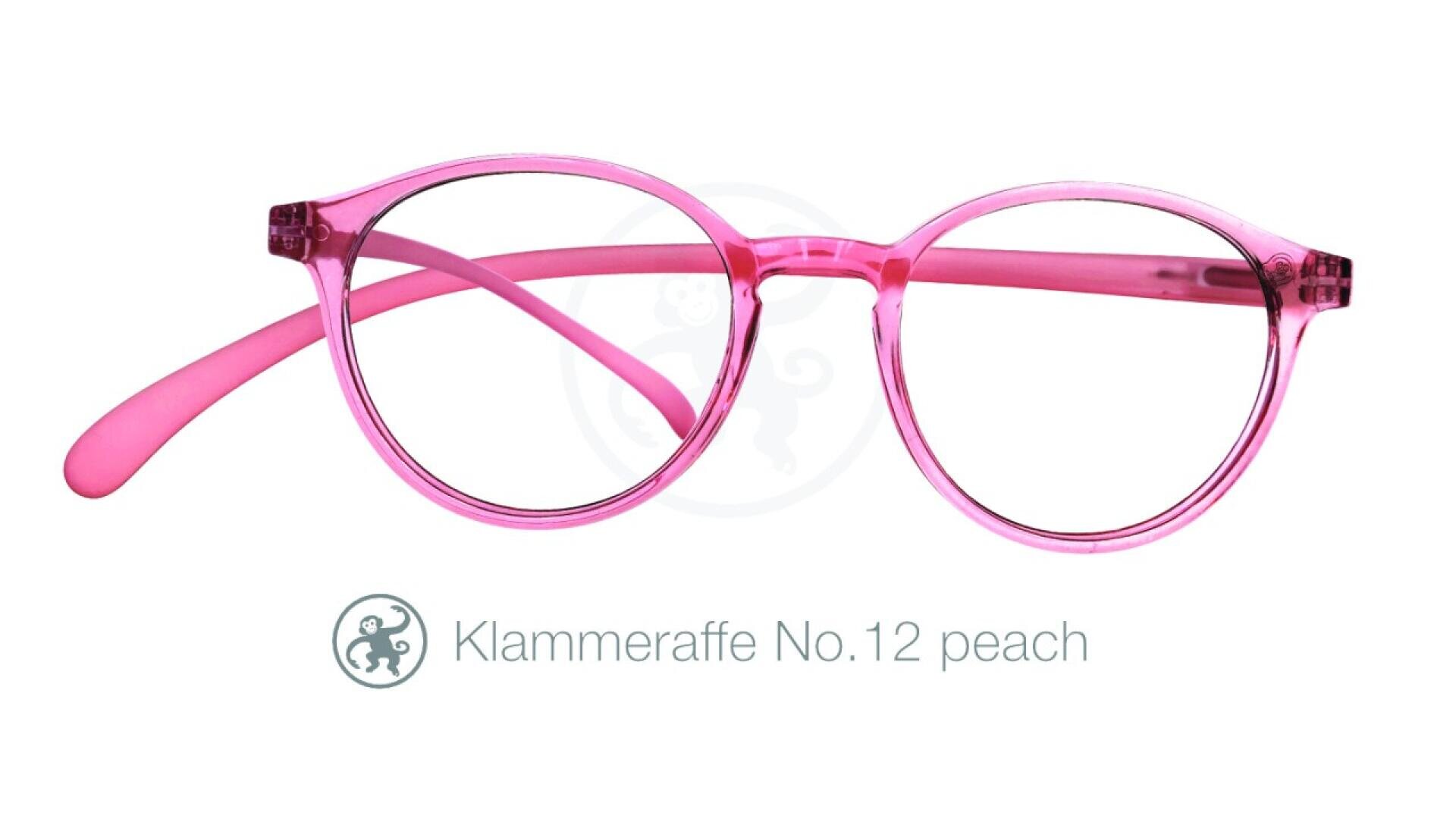 Leuchtend rosafarbene, runde Brille mit klaren Gläsern vor weißem Hintergrund. Unter der Brille steht der Text „Klammeraffe Nr. 12 Pfirsich“ mit einem kleinen Affensymbol links.