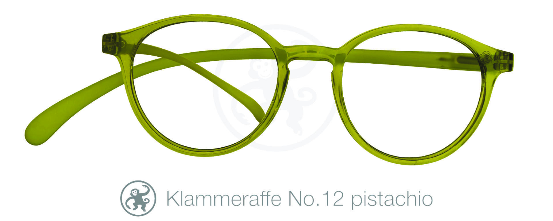 A pair of round, translucent pistachio green eyeglasses is shown against a white background. Below, text reads: “Klammeraffe No.12 pistachio” with a small monkey logo beside it.