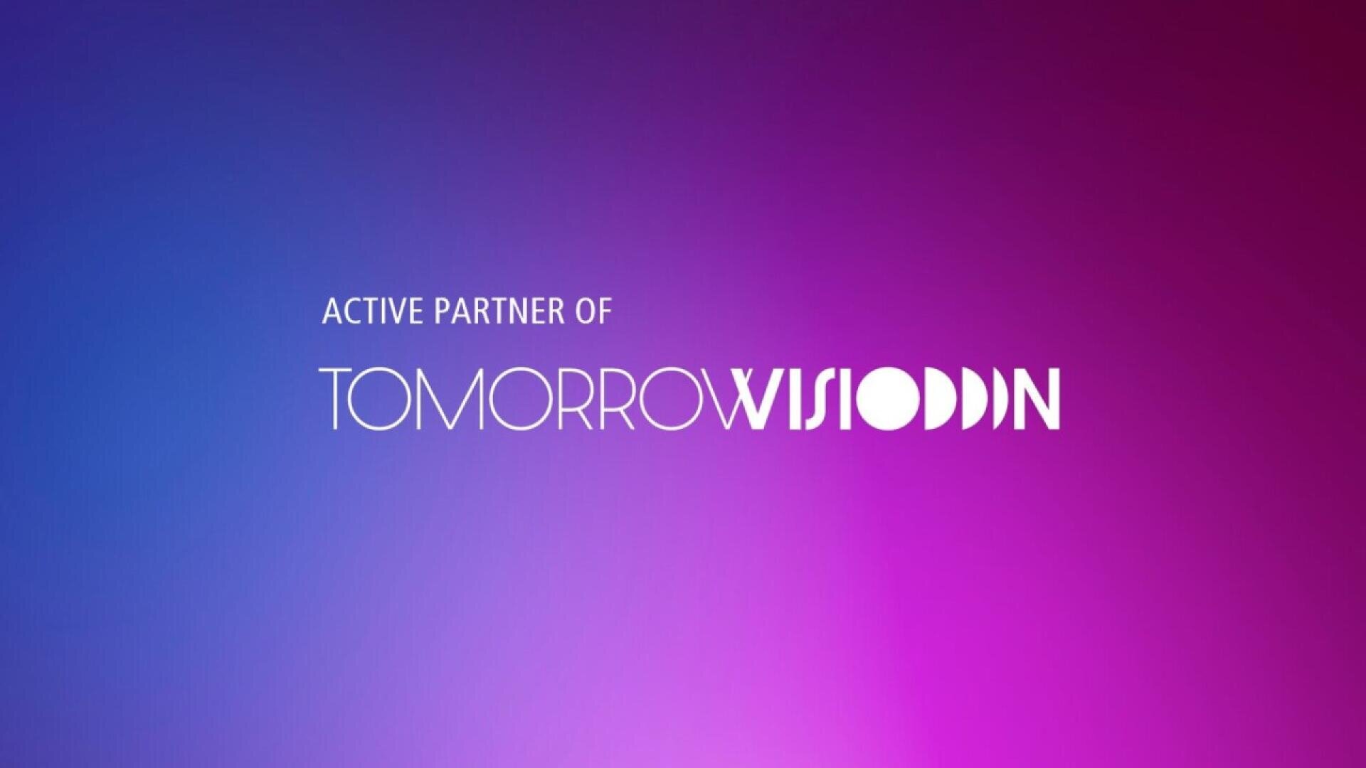 Gradient background of blue and pink with white text that reads ACTIVE PARTNER OF TOMORROW VISION, where VISION is stylized with unique letter shapes.