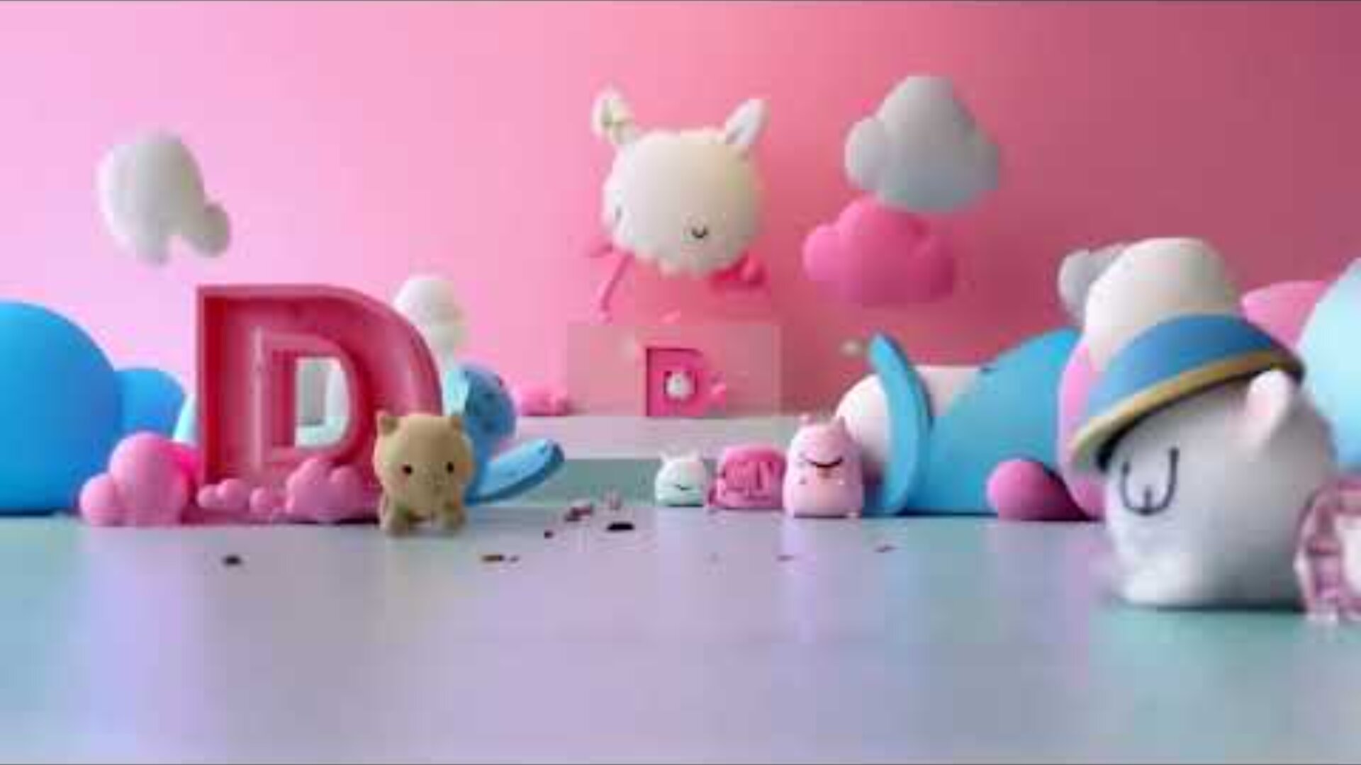 A pastel-colored scene with plush animal toys, clouds, and large pink letters D and P on a light blue and pink background. The setting is whimsical and playful.