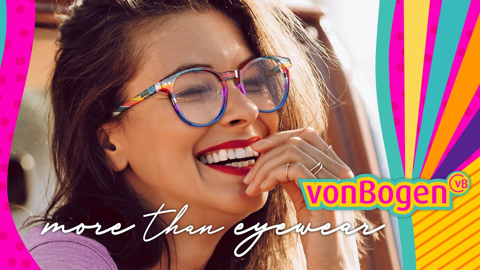A smiling woman with long brown hair wears colorful, round glasses. The text says vonBogen and more than eyewear on a colorful, vibrant background with pink, yellow and orange accents.