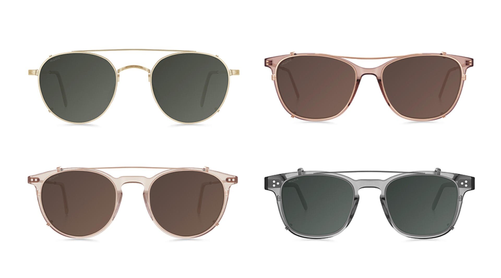 Vier Sonnenbrillen in verschiedenen Stilen und Farben sind auf weißem Hintergrund in zwei Zweierreihen angeordnet. Jedes Paar hat leicht unterschiedliche Rahmenformen und Glastönungen.